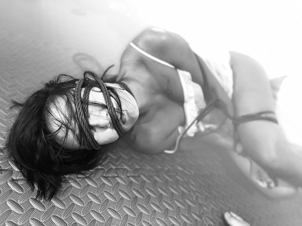 A black-and-white rope portrait
